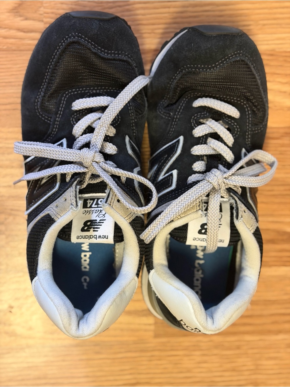 Unisex Black and Grey New Balance 574 Sneakers. Women 9.5, Men  8.